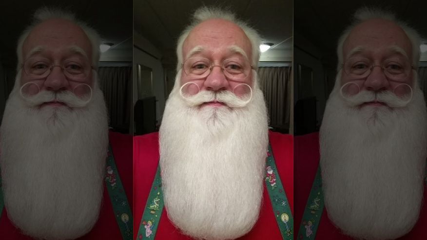 Eric Schmitt-Matzen volunteers as Santa Claus at a local Tennessee hospital.