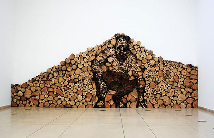 log and wood piling - wood art, works of art