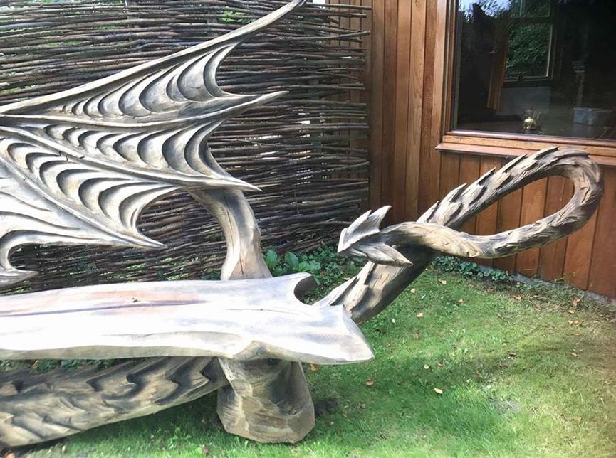 Estonian Artist Carve Spectacular Dragon Bench Using Chainsaw