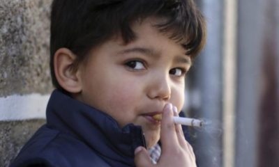 Portugal celebrates Epiphany with children 5 years old smoking cigarettes