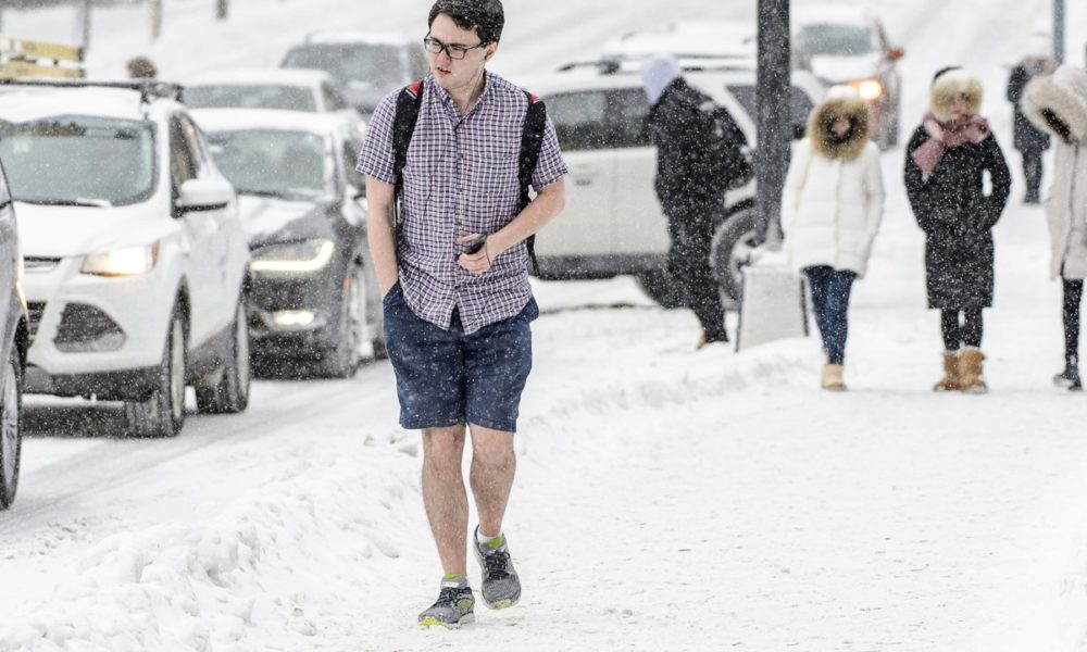 University of Wisconsin-Madison student walking shorts in snow