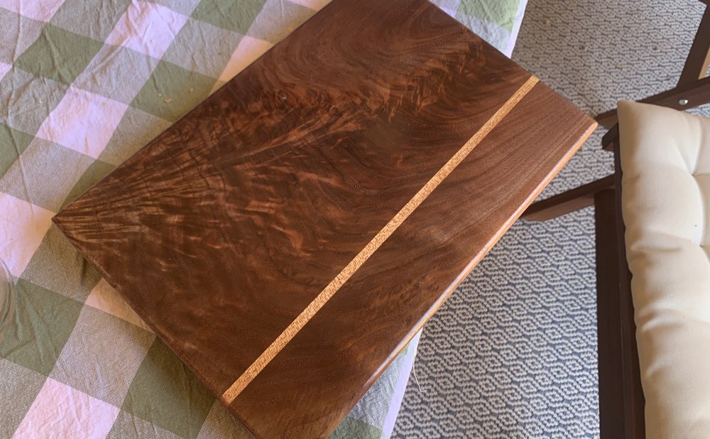 Hardwood cutting board and charcuterie board made from offcuts