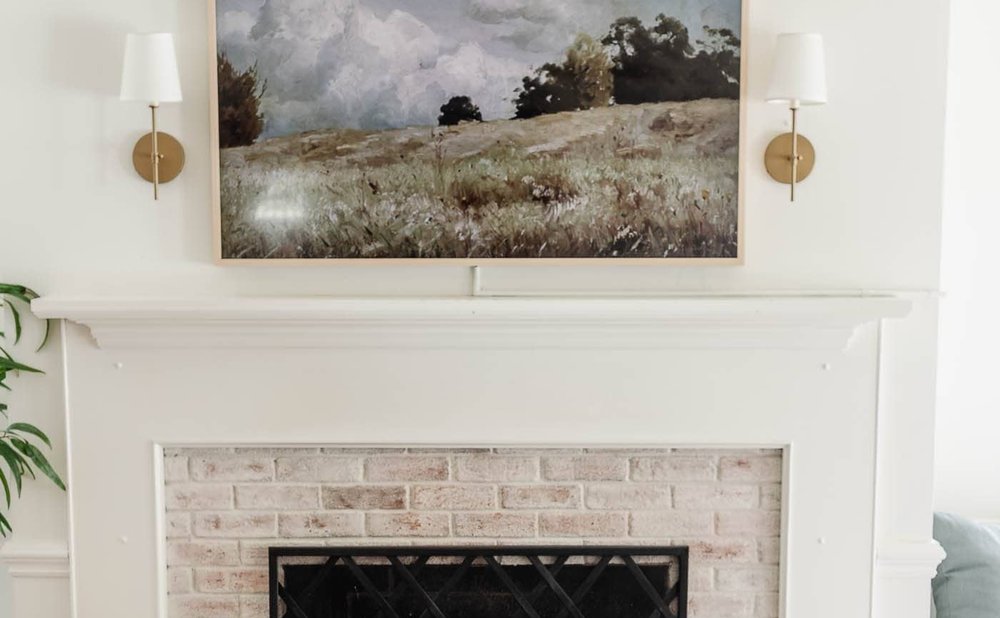 Limewash fireplace in a chalky warm white with soft old-world texture