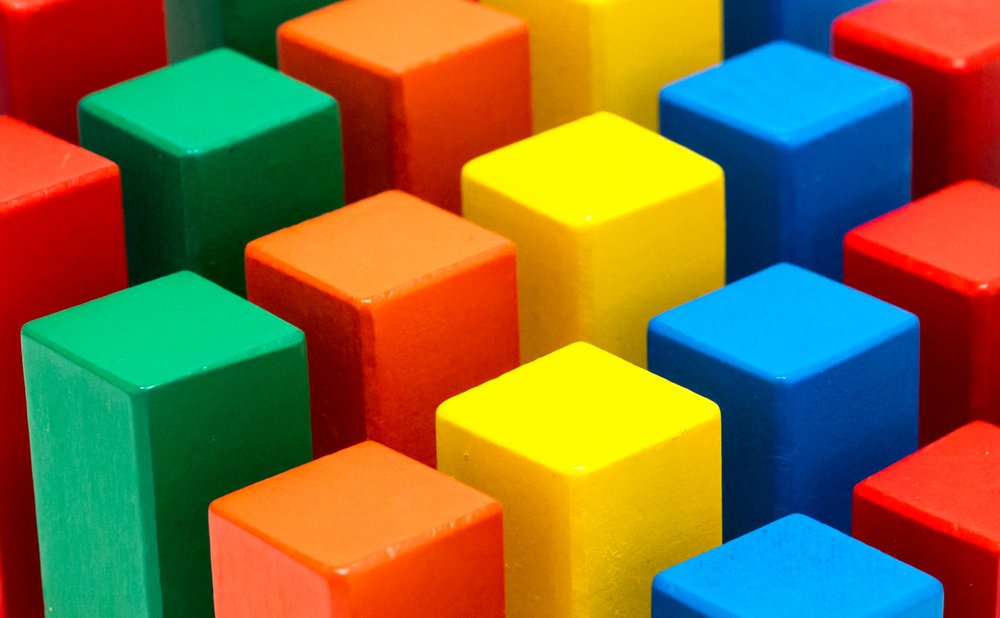 Wooden toy blocks and a simple puzzle for kids made from scrap wood