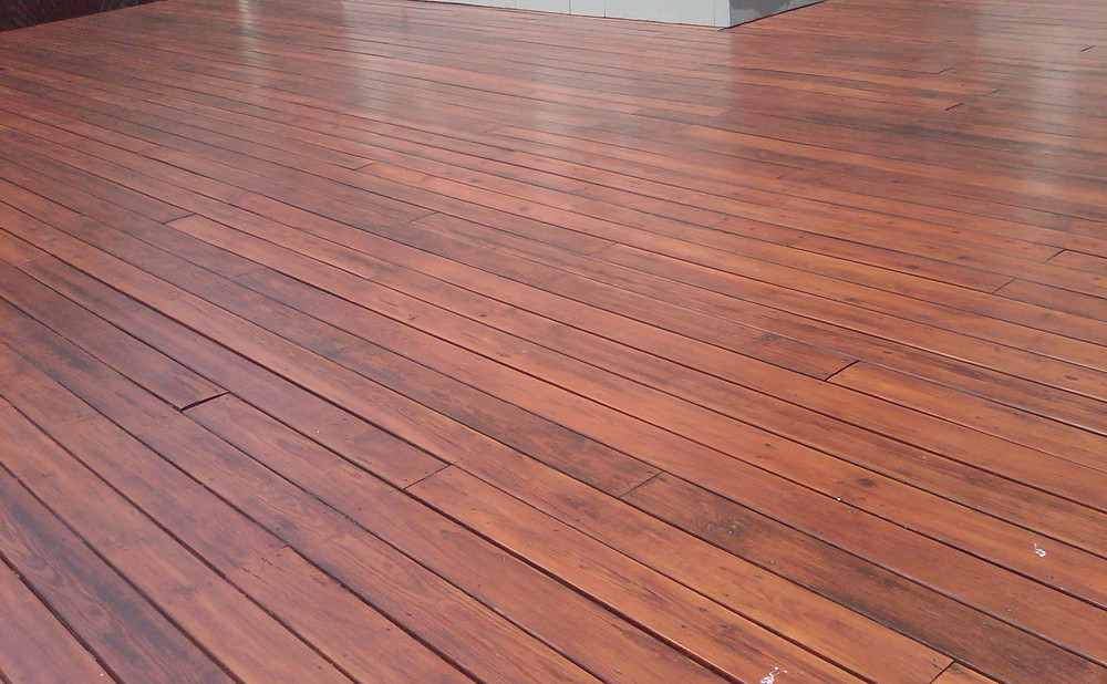 Cost and Time: DIY Stain vs Hiring Deck Restoration
